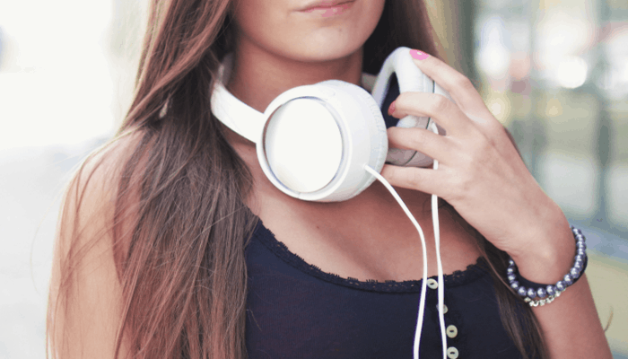 Woman with white headphone