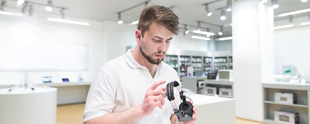 Man checking headphone