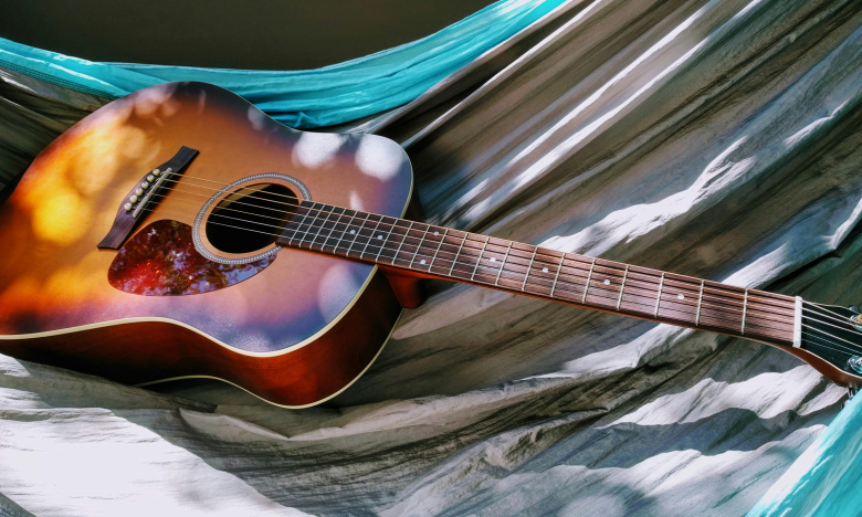 acoustic guitar on hammock