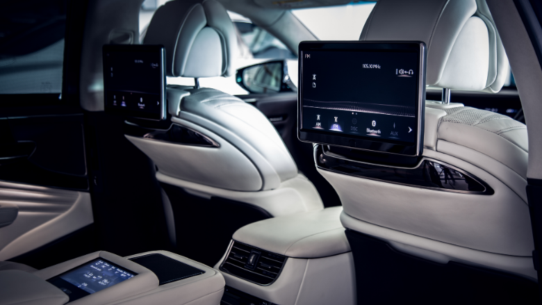 luxury car interior with rear seat entertainment system