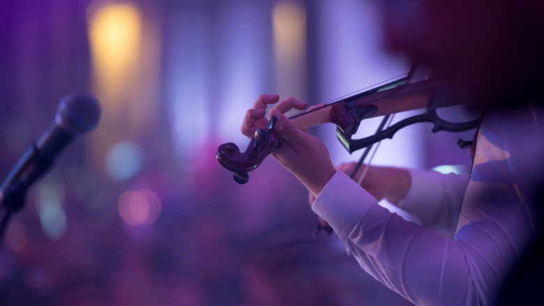 violinist playing on stage