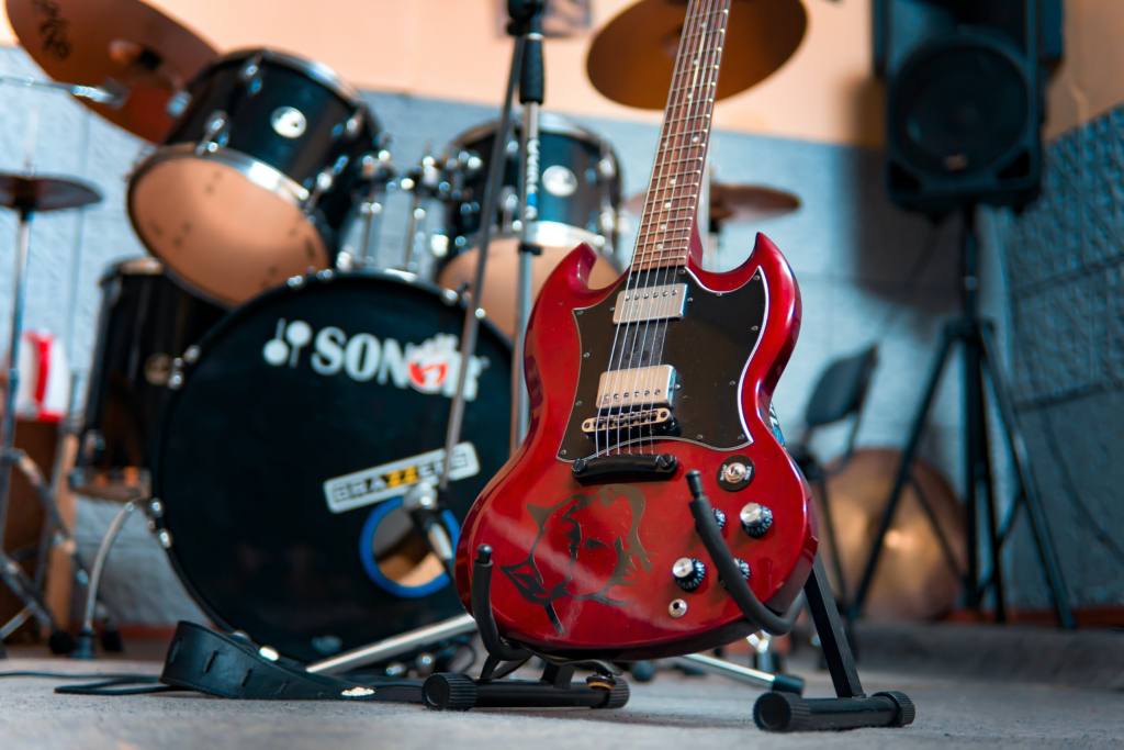 088f085f-aba3-445d-a18f-a8a7a6beeafe guitar and drums